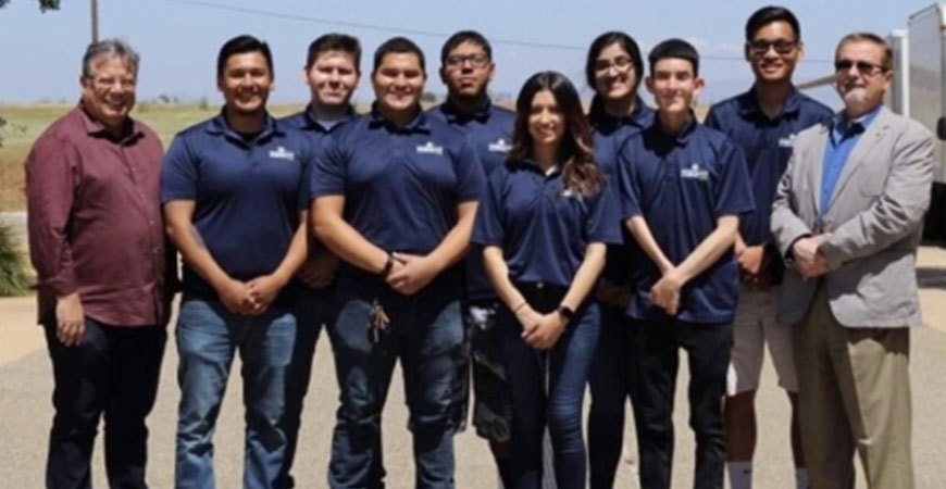 Group photo of advisors and students